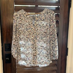 Very nice paisley material blouse.
